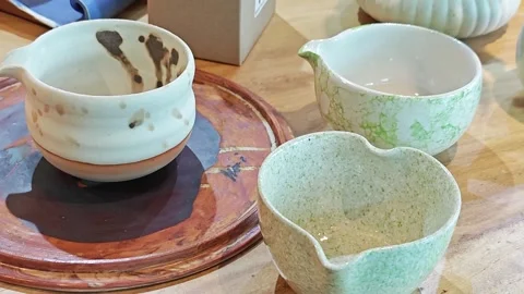 Handmade glazed ceramic tea cups. Stock Footage 339989463