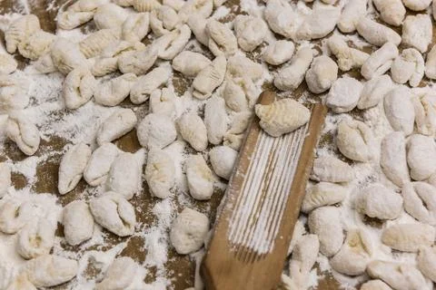 Handmade gnocchi  on the table. Stock Photos