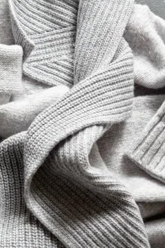 Handmade grey knitting wool texture background Stock-Fotos