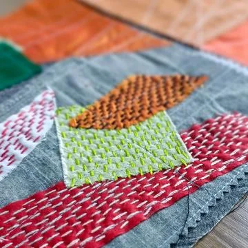Handmade japanese stitching in progress macro detail. Fotos Stock