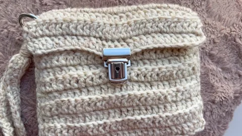 Handmade Knitted E-Book Bag. Creative Craft Idea, Video for Editorial Stock Footage 329968307