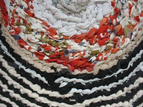 Handmade knitted Mat fabric ribbons Stock Photos