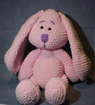 Handmade knitted pink Easter bunny Stock Photos