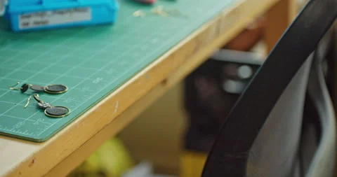 Handmade Leather Earrings on Table Video stock 145176298