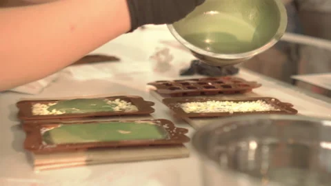 Handmade liquid green matcha or mint chocolate bar Stock Footage 205027520