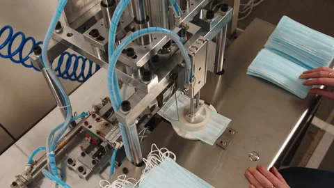 Handmade on machine for production of anti-virus protective masks from Stock Footage 204039255