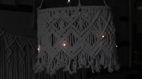 Handmade macrame lampshades hanging open design in natural colours.boho style Stock Footage 159405518