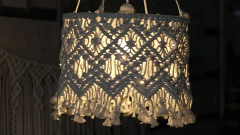 Handmade macrame lampshades hanging open design in natural colours.boho style Stock Footage 159617725