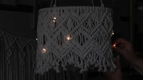 Handmade macrame lampshades hanging open design in natural colours.boho style Stock Footage 159755222