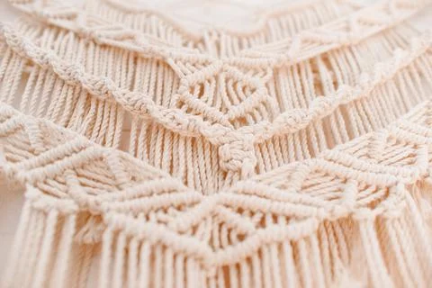 Handmade macrame pattern a fragment of a wall panel in the boho style Foto stock