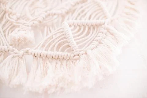 Handmade macrame pattern a fragment of a wall panel in the boho style Stock Photos