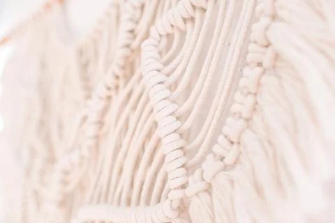 Handmade macrame pattern a fragment of a wall panel in the boho style Stock Photos