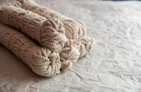 Handmade macrame thread, material for a natural modern decor concept Stock Photos
