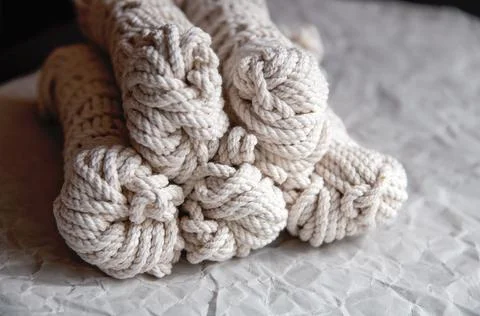 Handmade macrame thread, material for a natural modern decor concept Stock Photos