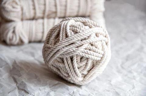 Handmade macrame thread, material for a natural modern decor concept Stock Photos
