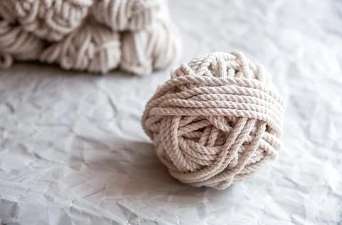Handmade macrame thread, material for a natural modern decor concept Stock Photos