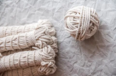 Handmade macrame thread, material for a natural modern decor concept Stock Photos