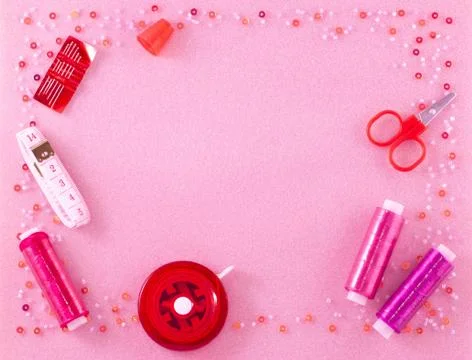 Handmade materials on a pink background. Stock Photos
