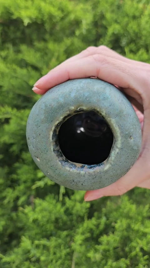 Handmade Matte Ceramic Vase Rotating Close Up Video stock 324596461