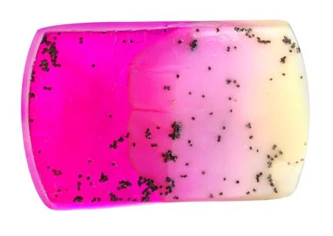 Handmade natural pink solid soap with exotic seeds, isolated on white backgro 스톡 사진