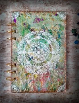 Handmade notebook with white mandala Stock Photos