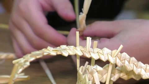 Handmade old-fashioned decoration made of straw. Stock Footage 106775592