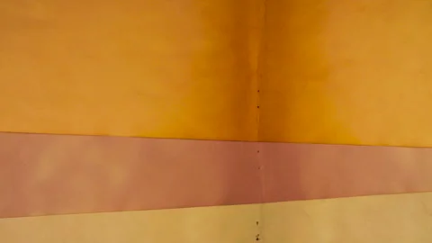 Handmade paper texture in warm mustard and dusty pink shades. Stock-Footage 330264073