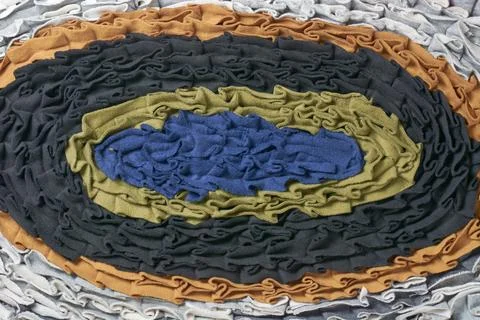 Handmade patchwork fabrics pattern mat in full frame Stock Photos