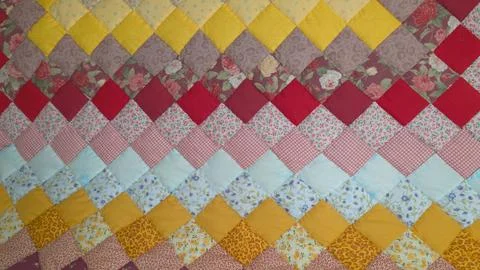 Handmade Patchwork quilt as background Geometrical pattern Stock Photos
