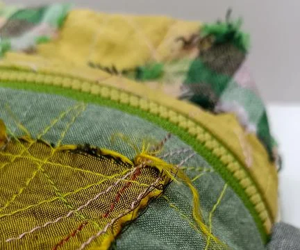 Handmade patchwork zipper pouch angled view. Stockfoto's