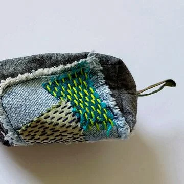 Handmade patchwork zipper pouch textile bag Stockfoto's