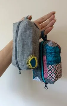 Handmade patchwork zipper pouches created from reclaimed textiles and fabric scr Stock Photos
