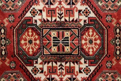 Handmade Persian rug geometric pattern old Persian carpet closeup Copyrigh... Stock Photos