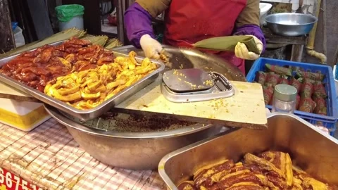 Handmade pork glutinous rice dumpling wrapped in reed leaves. Stock-Footage 336907045