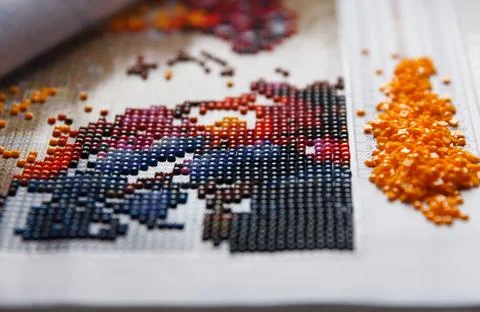 Handmade process of creation of diamond painting 3d from square rhinestones Stock Photos