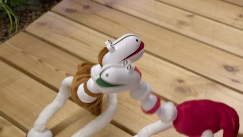 Handmade puppet dolls dragons on the strings close up Stock Footage 230313314