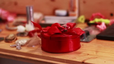 Handmade Red Box Gift on table Stock Footage 58148920