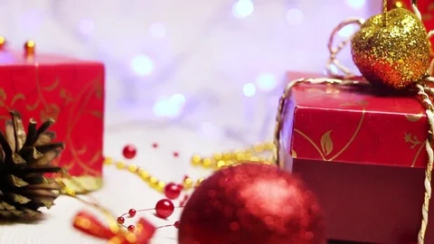 Handmade red gift box and Christmas decorations with twinkling flashlights Video stock 82407585