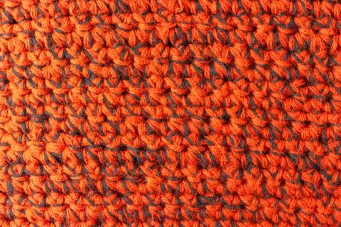 Handmade red knitting texture background Stock-Fotos