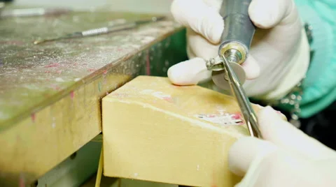 Handmade ring for a dental prosthesis shaped by a skilled technician Stock Footage 59940206