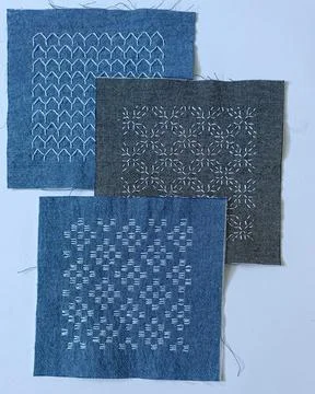Handmade Sashiko Embroidery Samples on Light Background.  Stock Photos