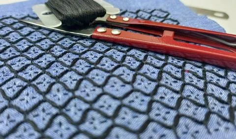 Handmade Sashiko Pattern and Scissors.  Stock Photos