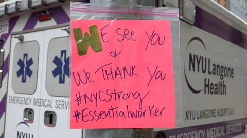 Handmade Sign Thanking Doctors &amp; Essential Workers During Coronavirus Pandemic Stock-Footage 127874050