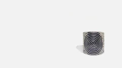 Handmade silver vintage ring with infinity symbol on white background. Magic Stock Photos