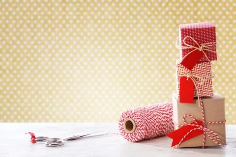 Handmade small boxes with scissors and spool Stock Photos