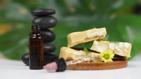 Handmade soap made from squeezing soap slivers, pyramid of stones and oil, the Stock Footage 141008236