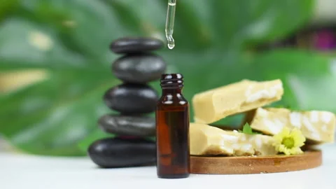 Handmade soap made from squeezing soap slivers, pyramid of stones and oil, the Stock Footage 141136349