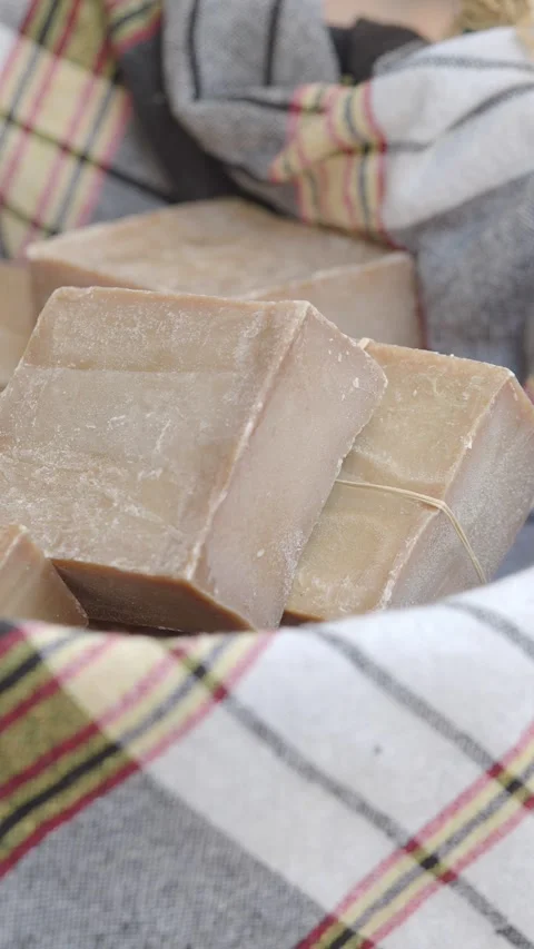 Handmade soap making process in a cozy workshop setting Stock Footage 316575919