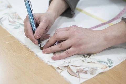 Handmade tailoring fabric cutting process Stock Photos