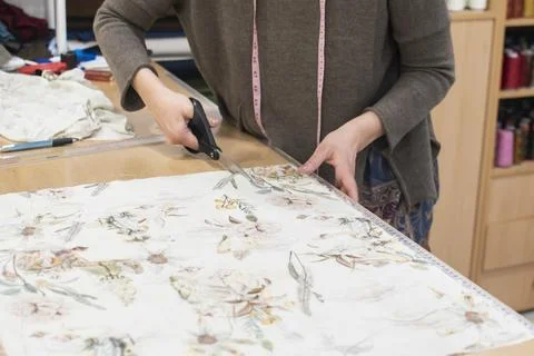 Handmade tailoring fabric cutting process Stock Photos